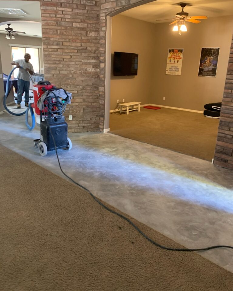 Dust Fighters AZ crew performing dustless tile removal using HEPA filtration in a Phoenix home.