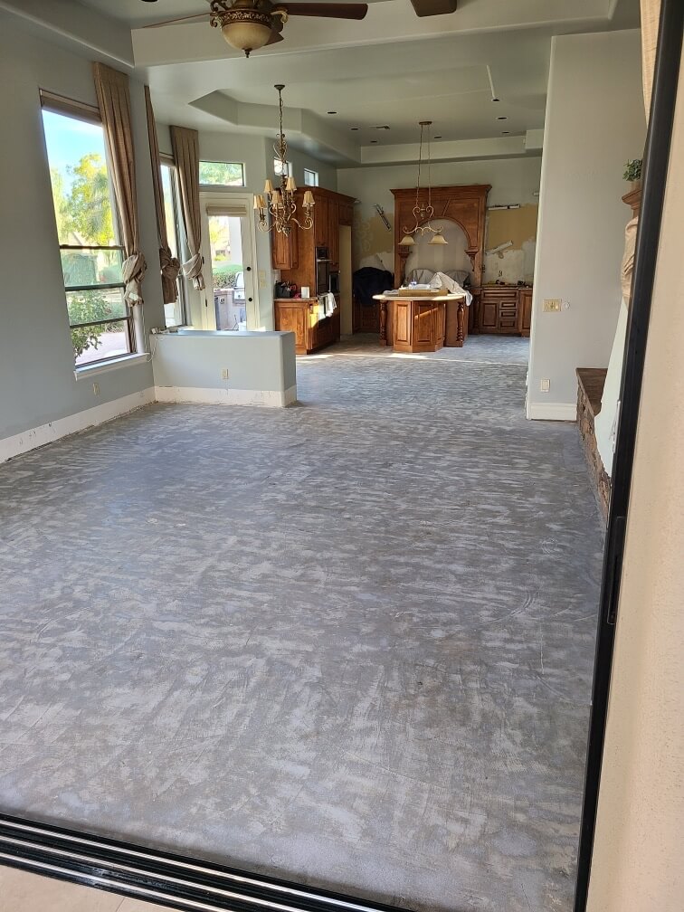 alt="Dust Fighters AZ crew performing dustless tile removal in a luxury Scottsdale home"